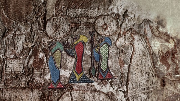 Examine the intricacies of the Oseberg Tapestry