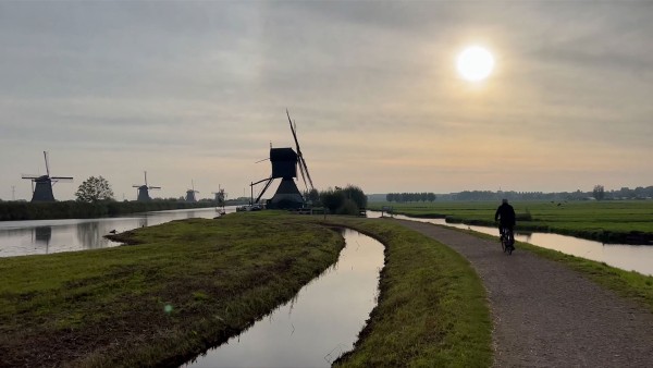 Explore charming Amsterdam and picturesque Kinderdijk with Alastair Miller
